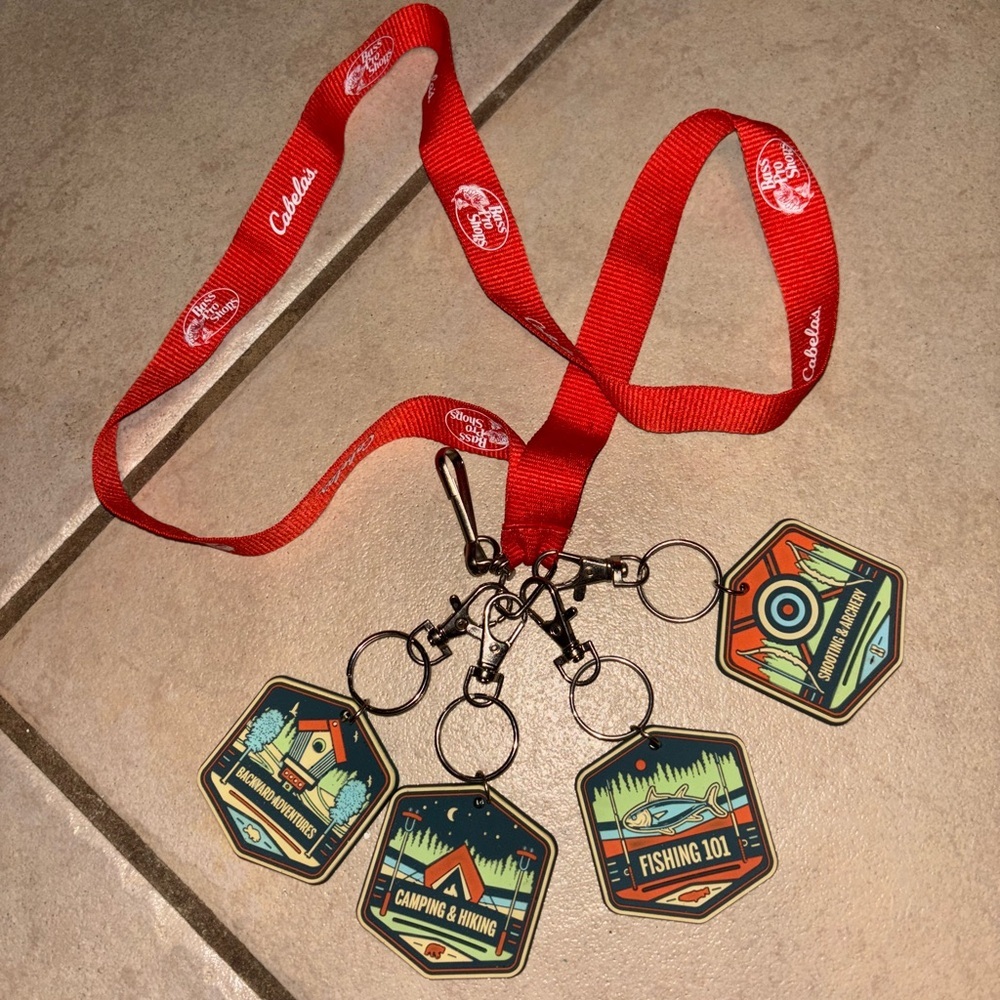 Cabela's Red Lanyard with Boy scout like badges